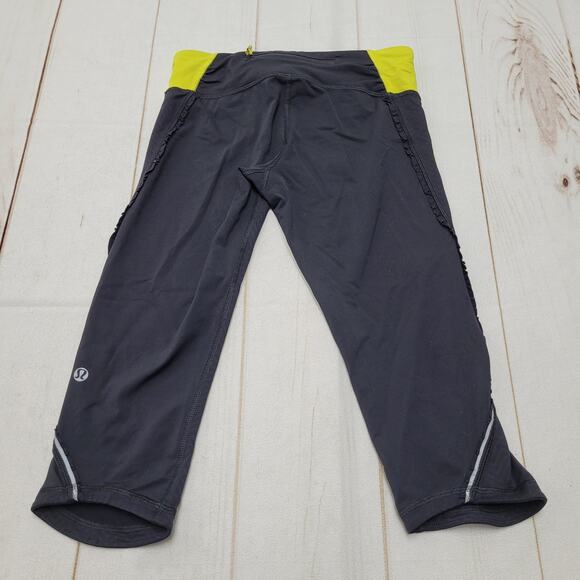 Lululemon black ruffle crop capri leggings 4 yellow - Picture 1 of 7